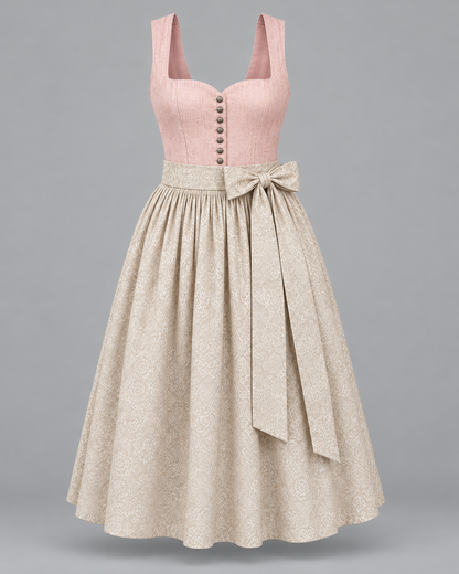 Dirndl in Rosa mit cremefarbener Schürze – Produktfoto Vorderseite ohne Bluse