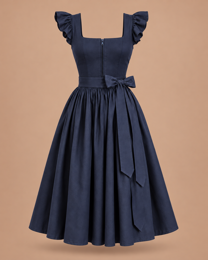 Kleid im Dirndl-Stil in Marineblau mit Schleife – Produktfoto Vorderseite